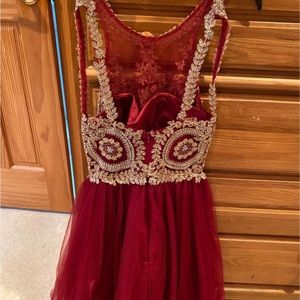 Size small red and gold Bou Bou semi formal dress.